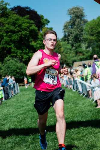 Photo of Oli running the Buckingham 10km