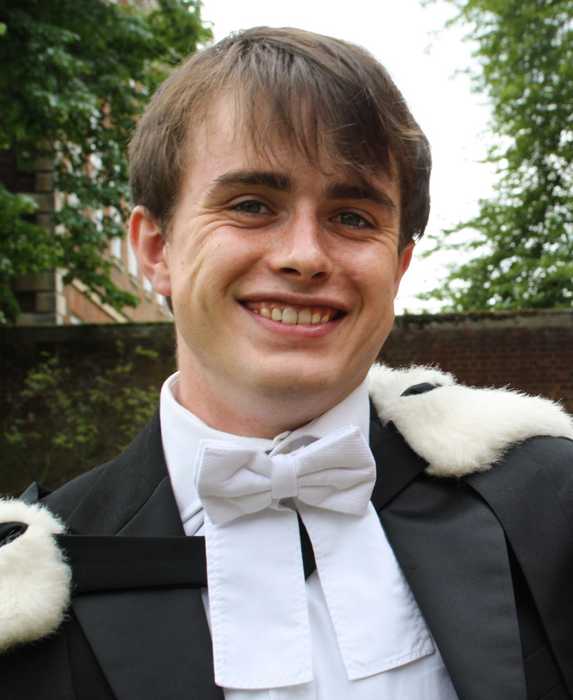 Photo of Oli at his graduation